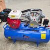 This is a Maxmech 100-liter gasoline engine air compressor.